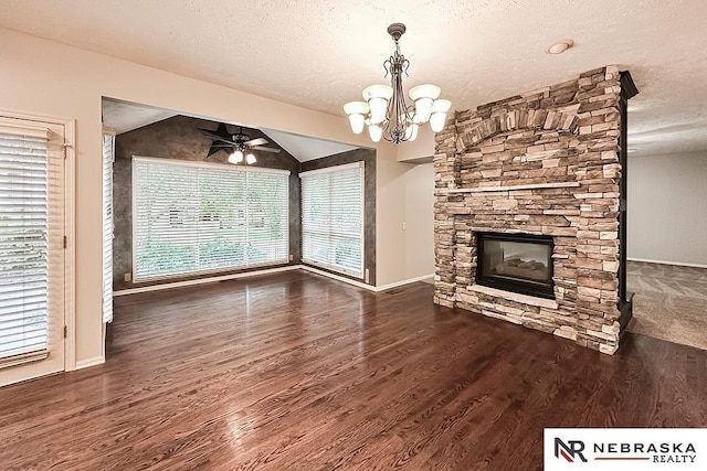 1425 S 158th Cir, Omaha, NE 68130 - unfurnished living room with wood finished floors, a chandelier, a fireplace, a textured ceiling, and ceiling fan