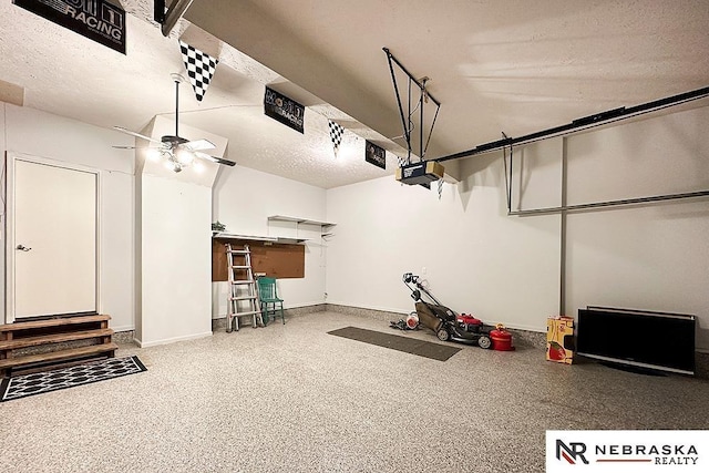 1425 S 158th Cir, Omaha, NE 68130 - garage with a garage door opener and a ceiling fan