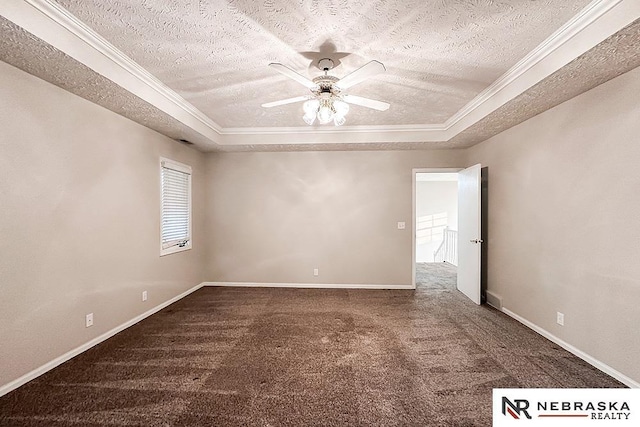 1425 S 158th Cir, Omaha, NE 68130 - carpeted empty room featuring a textured ceiling, a tray ceiling, ceiling fan, and ornamental molding
