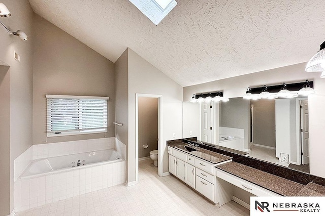 1425 S 158th Cir, Omaha, NE 68130 - full bathroom with a bath, a textured ceiling, vaulted ceiling, vanity, and tile patterned flooring