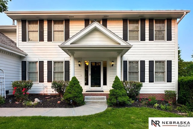 1425 S 158th Cir, Omaha, NE 68130 - colonial house featuring a front lawn