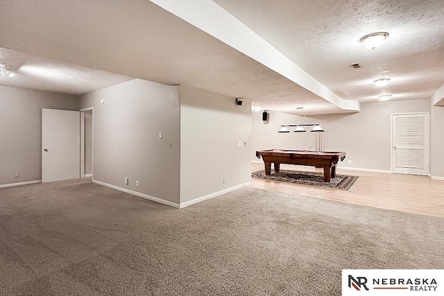 1425 S 158th Cir, Omaha, NE 68130 - playroom with billiards, carpet, and a textured ceiling