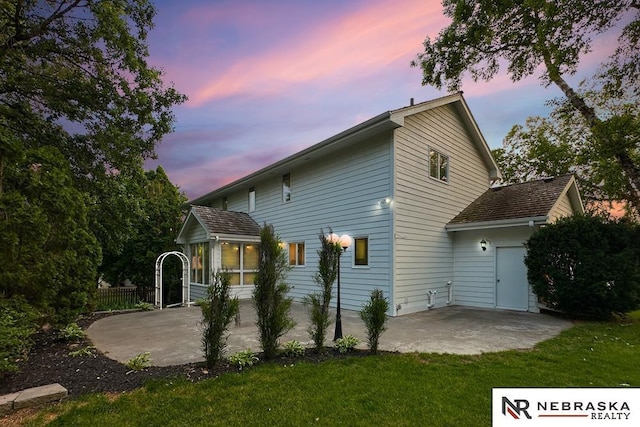 1425 S 158th Cir, Omaha, NE 68130 - rear view of property featuring a patio