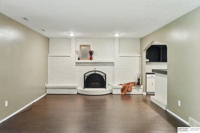 7504 S 46th Ave, Omaha, NE 68157 - living area featuring a brick fireplace and wood finished floors