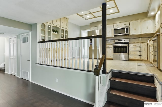 7504 S 46th Ave, Omaha, NE 68157 - staircase with baseboards and recessed lighting