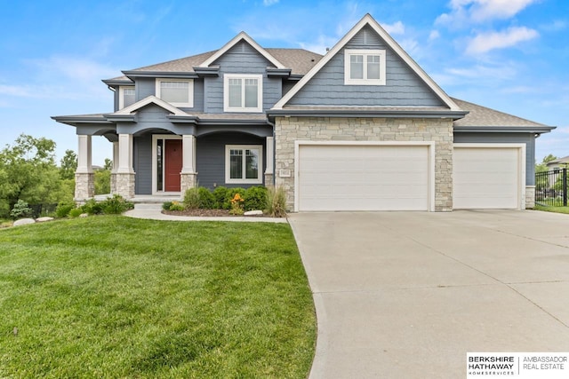 19014 Pratt Cir, Elkhorn, NE 68022 - craftsman house with stone siding, concrete driveway, and an attached garage