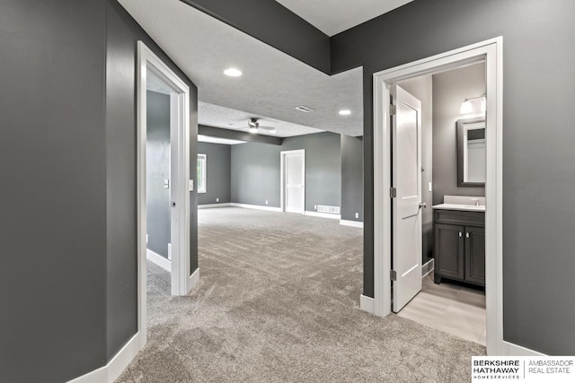 19014 Pratt Cir, Elkhorn, NE 68022 - corridor featuring light colored carpet and recessed lighting