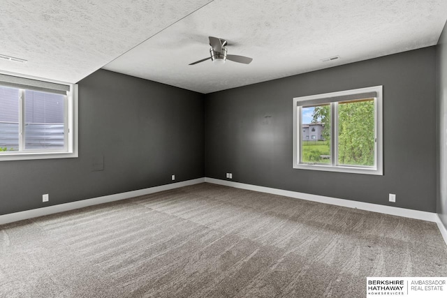 19014 Pratt Cir, Elkhorn, NE 68022 - spare room featuring a textured ceiling, carpet floors, and ceiling fan
