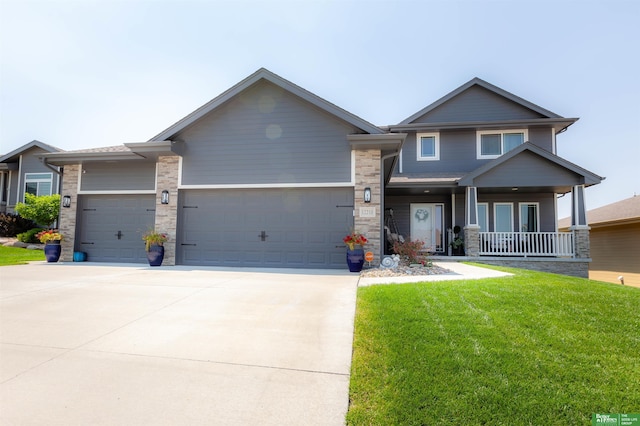 12210 Quail Dr, Bellevue, NE 68123 - craftsman-style house with a garage, a porch, a front yard, and driveway