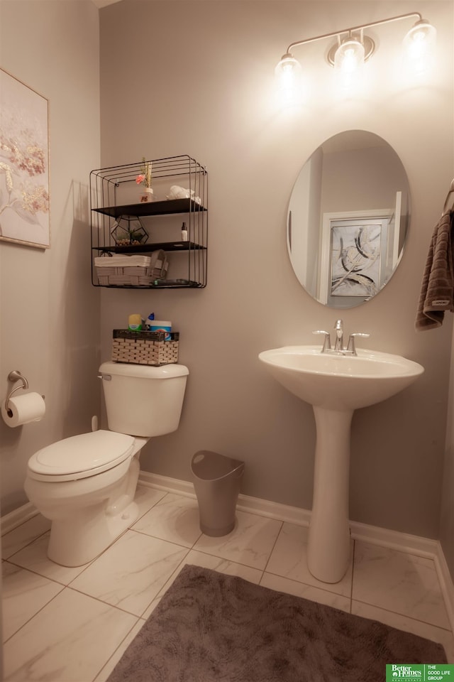 12210 Quail Dr, Bellevue, NE 68123 - half bathroom featuring marble finish floors