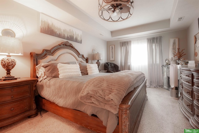 12210 Quail Dr, Bellevue, NE 68123 - bedroom with light colored carpet and a tray ceiling