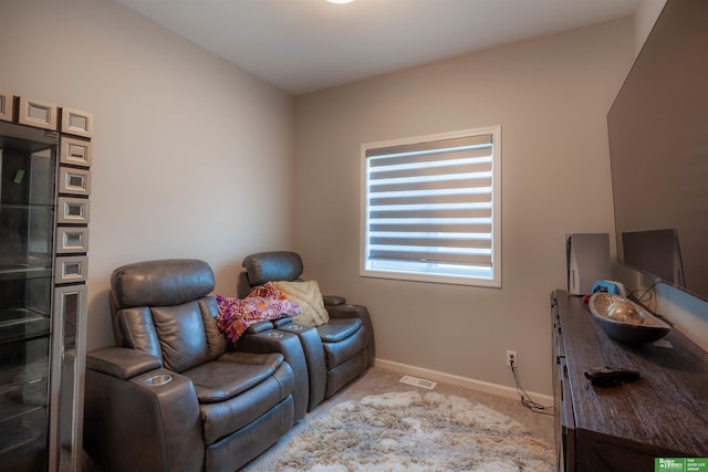 12210 Quail Dr, Bellevue, NE 68123 - sitting room with light colored carpet and baseboards