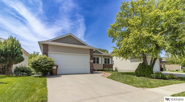 1933 Redstone Rd, Lincoln, NE 68521 - ranch-style home with a front lawn, driveway, brick siding, and a garage