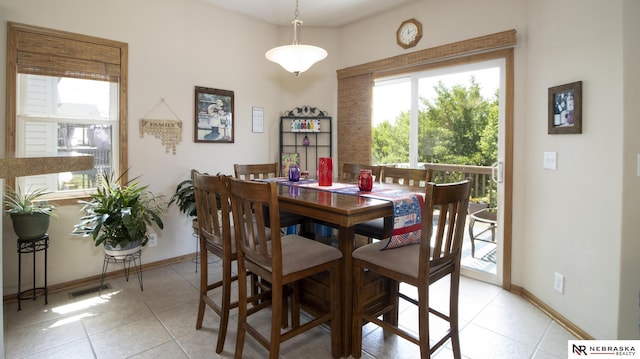 1933 Redstone Rd, Lincoln, NE 68521 - dining room featuring light tile patterned floors and baseboards