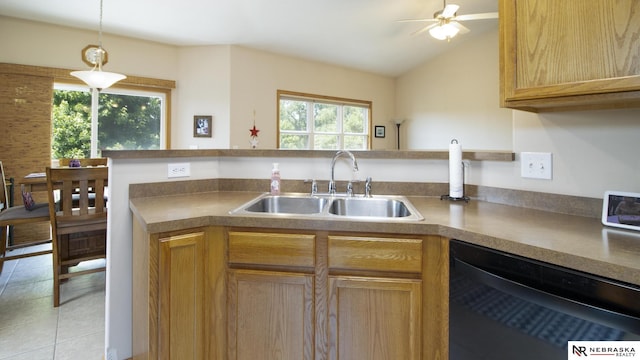 1933 Redstone Rd, Lincoln, NE 68521 - kitchen with dishwasher, decorative light fixtures, ceiling fan, lofted ceiling, and light tile patterned flooring