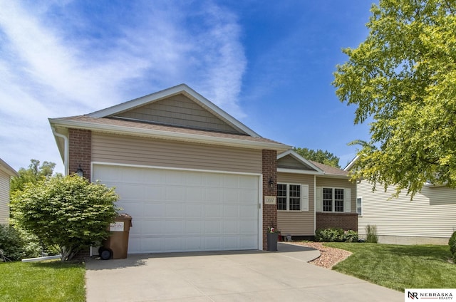 1933 Redstone Rd, Lincoln, NE 68521 - ranch-style home with concrete driveway, brick siding, an attached garage, a front yard, and a shingled roof