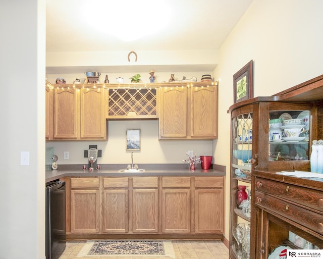 1933 Redstone Rd, Lincoln, NE 68521 - kitchen with dark countertops and dishwashing machine