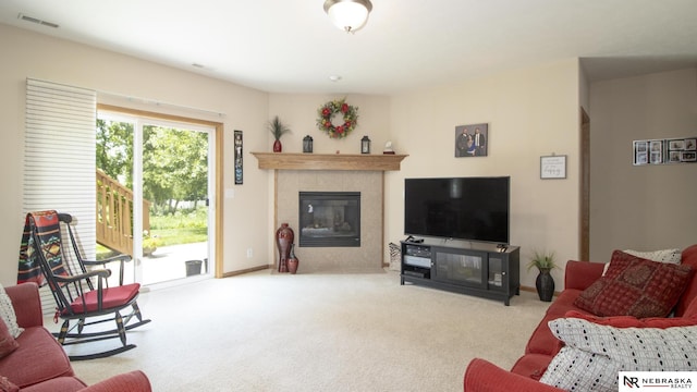 1933 Redstone Rd, Lincoln, NE 68521 - living room featuring a tile fireplace and carpet flooring