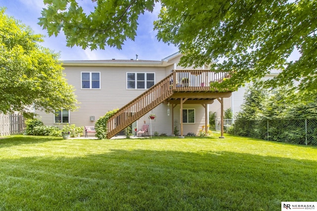 1933 Redstone Rd, Lincoln, NE 68521 - rear view of house featuring stairway and a wooden deck