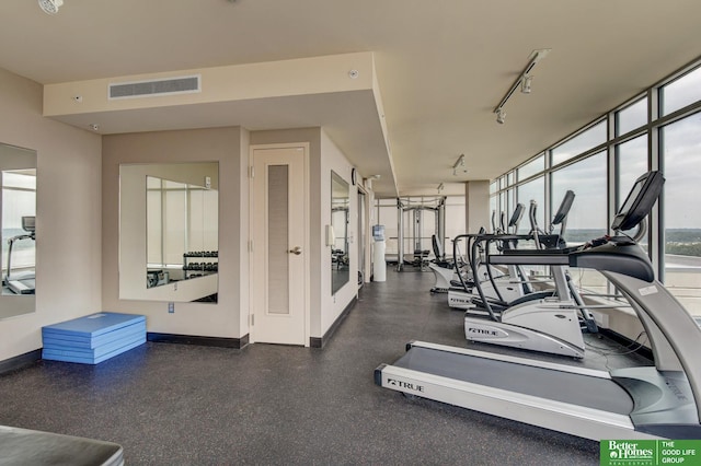 444 Riverfront Plz Unit 501, Omaha, NE 68102 - workout area featuring baseboards