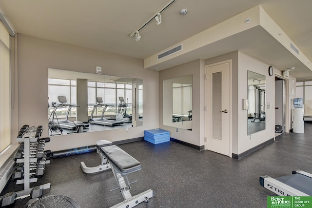 444 Riverfront Plz Unit 501, Omaha, NE 68102 - gym featuring baseboards