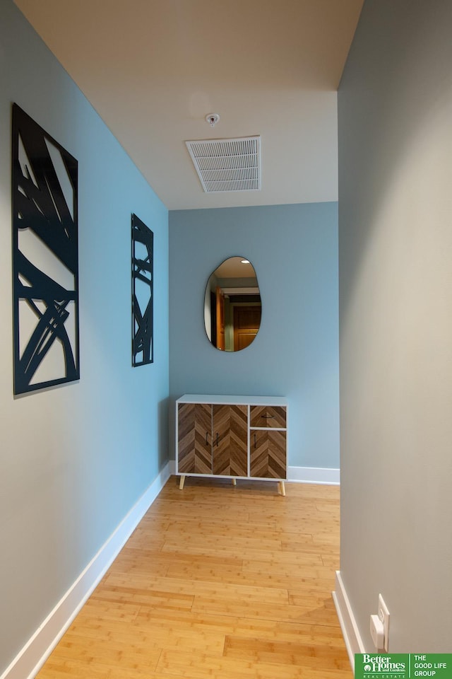444 Riverfront Plz Unit 501, Omaha, NE 68102 - hallway with wood finished floors and baseboards