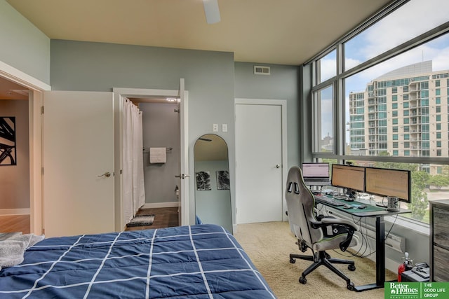 444 Riverfront Plz Unit 501, Omaha, NE 68102 - carpeted bedroom with a desk
