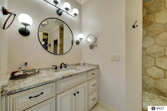 820 N 100th St, Lincoln, NE 68527 - full bath featuring crown molding, vanity, and a tile shower