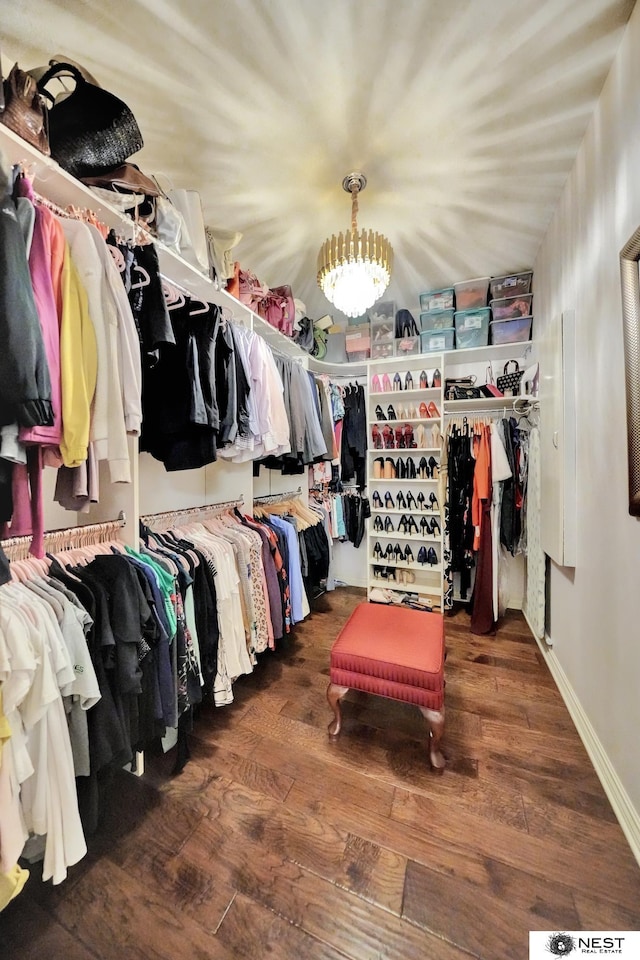 820 N 100th St, Lincoln, NE 68527 - walk in closet featuring wood finished floors and a chandelier