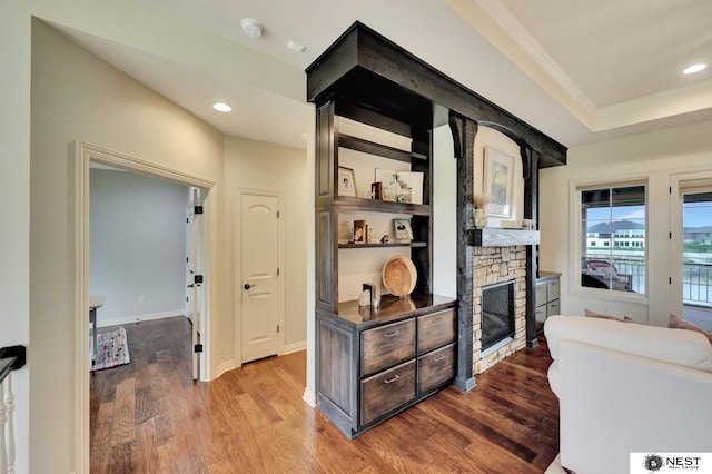 820 N 100th St, Lincoln, NE 68527 - hall with wood finished floors, ornamental molding, recessed lighting, and a raised ceiling