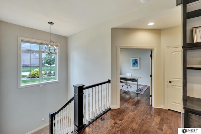 820 N 100th St, Lincoln, NE 68527 - hall with an upstairs landing, a chandelier, dark wood-style flooring, and recessed lighting