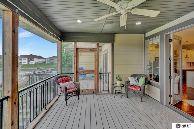 820 N 100th St, Lincoln, NE 68527 - wooden deck with a ceiling fan