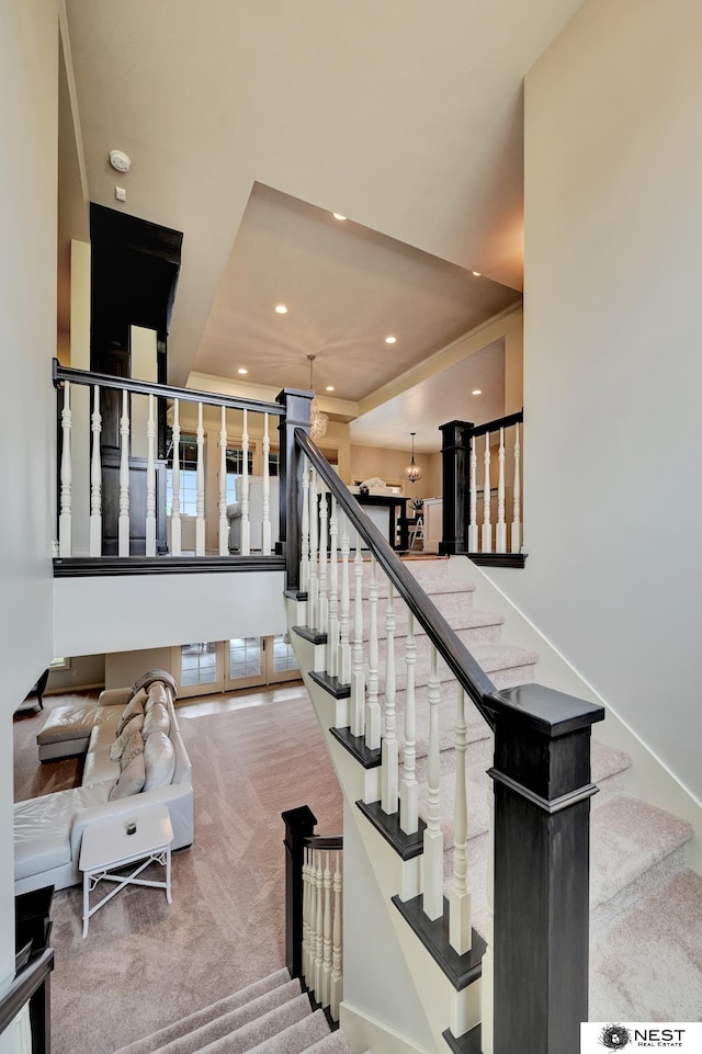 820 N 100th St, Lincoln, NE 68527 - staircase featuring recessed lighting and carpet