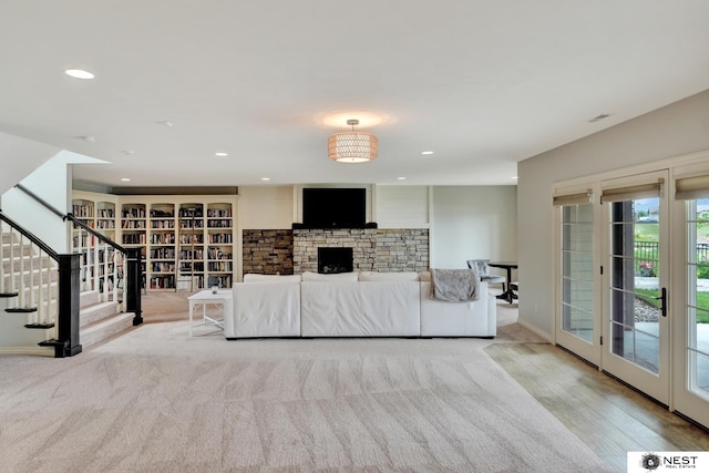 820 N 100th St, Lincoln, NE 68527 - living room with stairway, recessed lighting, and wood finished floors