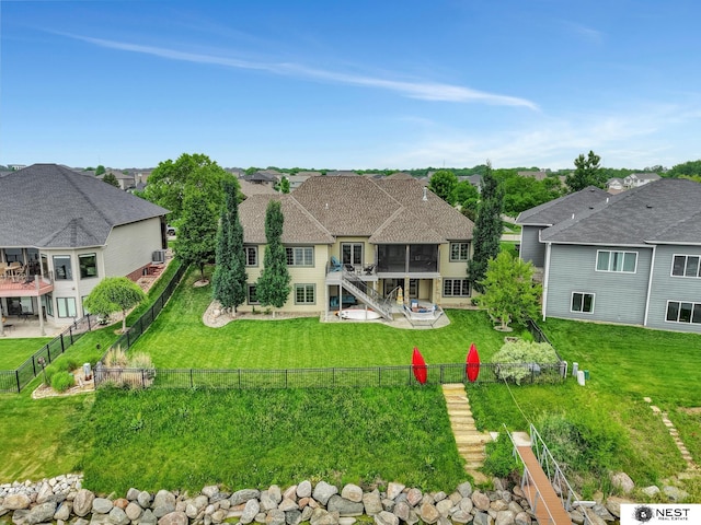 820 N 100th St, Lincoln, NE 68527 - back of house featuring stairs, a fenced backyard, a residential view, and a patio area