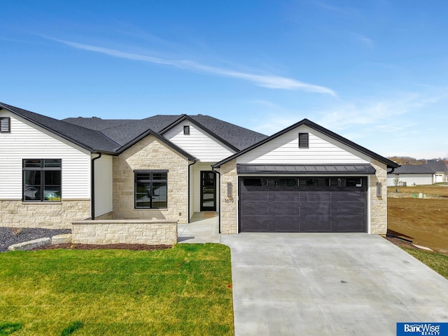 1619 S 93rd St, Lincoln, NE 68520 - view of front of property featuring stone siding, a garage, concrete driveway, a front lawn, and roof with shingles