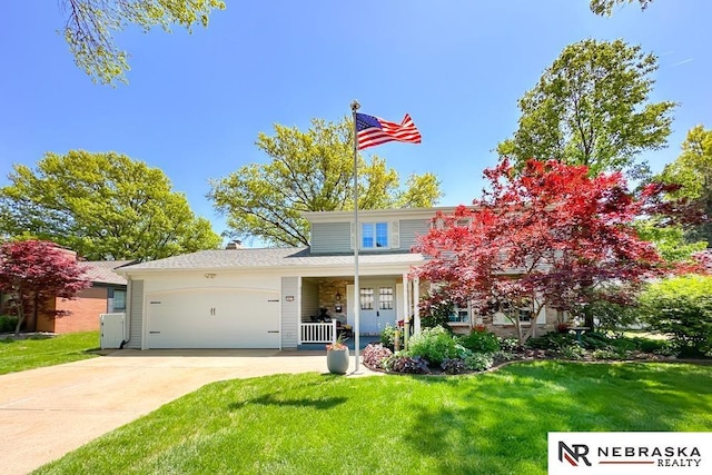 1817 Holling Dr, Omaha, NE 68144 - view of front of home with an attached garage, a front lawn, concrete driveway, and a porch