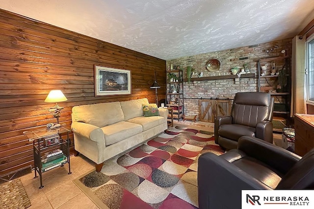 1817 Holling Dr, Omaha, NE 68144 - living area with a textured ceiling, wood walls, and brick wall
