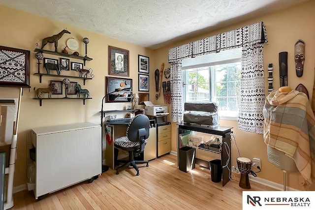 1817 Holling Dr, Omaha, NE 68144 - office featuring light wood-style floors and a textured ceiling