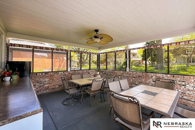 1817 Holling Dr, Omaha, NE 68144 - view of patio / terrace with outdoor dining space and ceiling fan