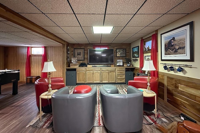1817 Holling Dr, Omaha, NE 68144 - living room featuring a paneled ceiling, dark wood-style floors, and wood walls