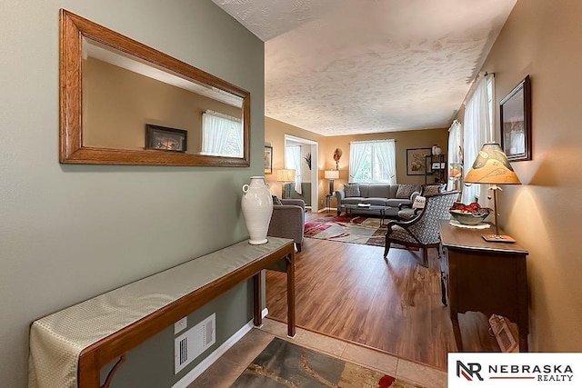 1817 Holling Dr, Omaha, NE 68144 - living area featuring a textured ceiling