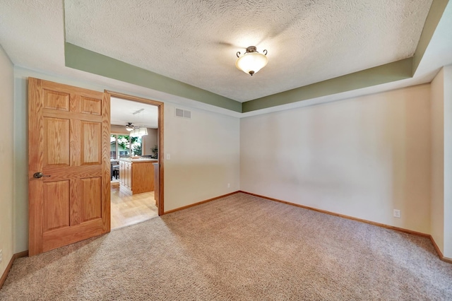 4630 Eagle Ridge Rd, Lincoln, NE 68516 - unfurnished room featuring light colored carpet and a textured ceiling