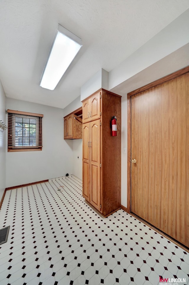 4630 Eagle Ridge Rd, Lincoln, NE 68516 - washroom with baseboards and light flooring