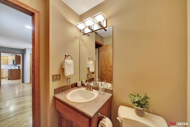 4630 Eagle Ridge Rd, Lincoln, NE 68516 - bathroom featuring vanity and wood finished floors