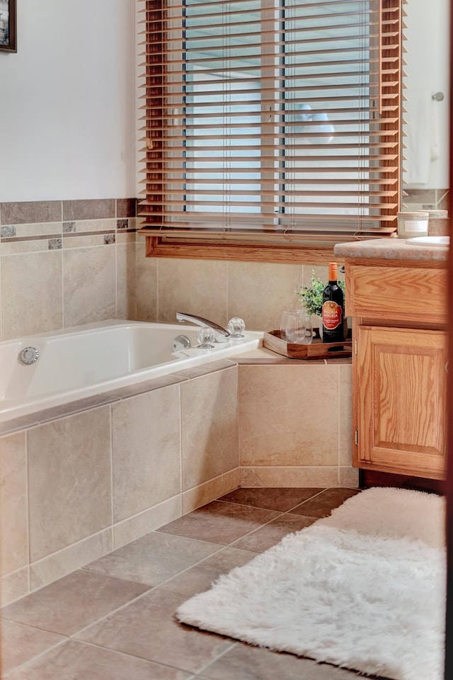 4630 Eagle Ridge Rd, Lincoln, NE 68516 - full bathroom featuring tile patterned flooring, a garden tub, and vanity