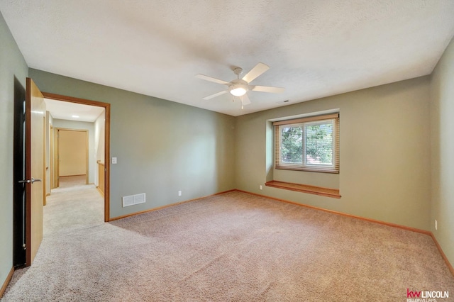 4630 Eagle Ridge Rd, Lincoln, NE 68516 - spare room featuring light colored carpet and ceiling fan