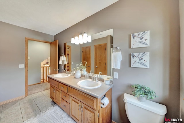 4630 Eagle Ridge Rd, Lincoln, NE 68516 - bathroom featuring double vanity and tile patterned floors