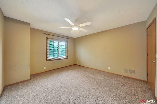 4630 Eagle Ridge Rd, Lincoln, NE 68516 - carpeted empty room featuring a ceiling fan and baseboards