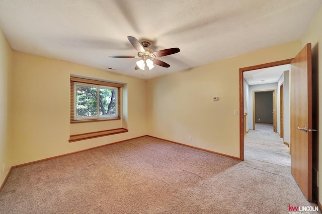 4630 Eagle Ridge Rd, Lincoln, NE 68516 - spare room featuring light carpet and a ceiling fan